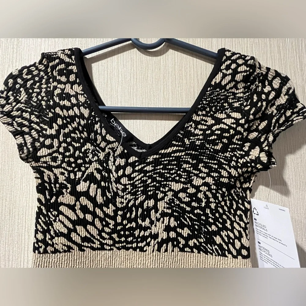 BEBE Stretch Nylon/Spandex w/Gold Metallic Accents Cap Sleeve “V”Neck Mini Dress - Picture 3 of 10